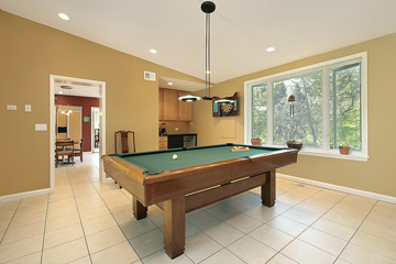 Warm tile floor in game room.